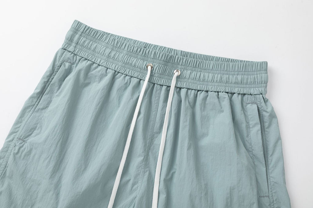 AMIRI Starburst logo shell swim shorts
